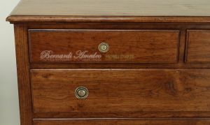 Reproduction of an antique chest of drawers handmade in planed and antiqued solid walnut wood